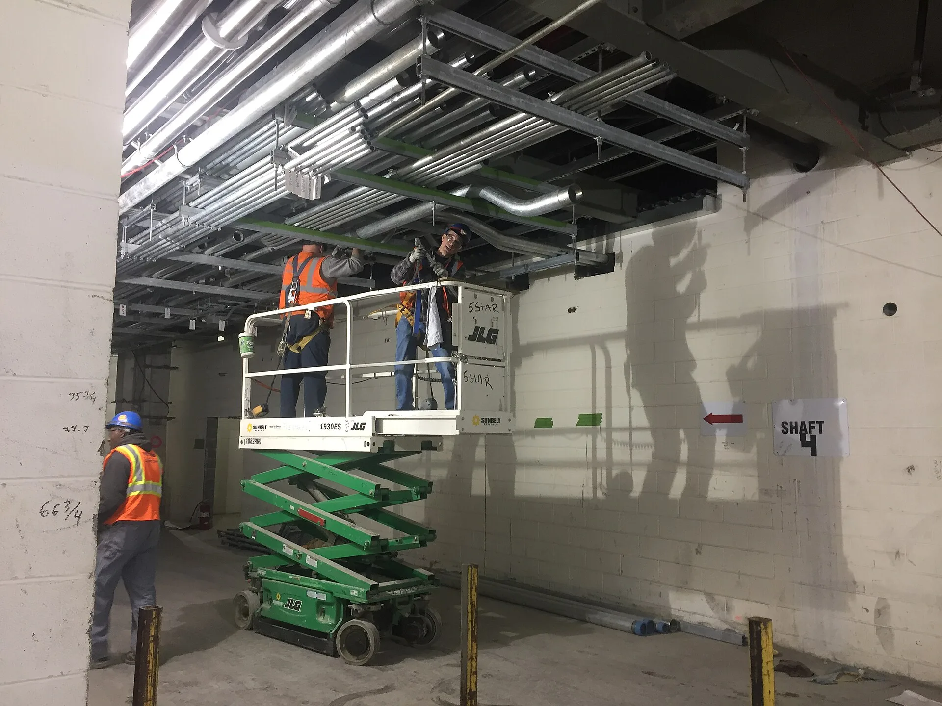Ductwork installation in the future LIRR passenger concourse. (CM014B, 01-17-2019). Ductwork Installation Cost in Ontario: A Local Breakdown