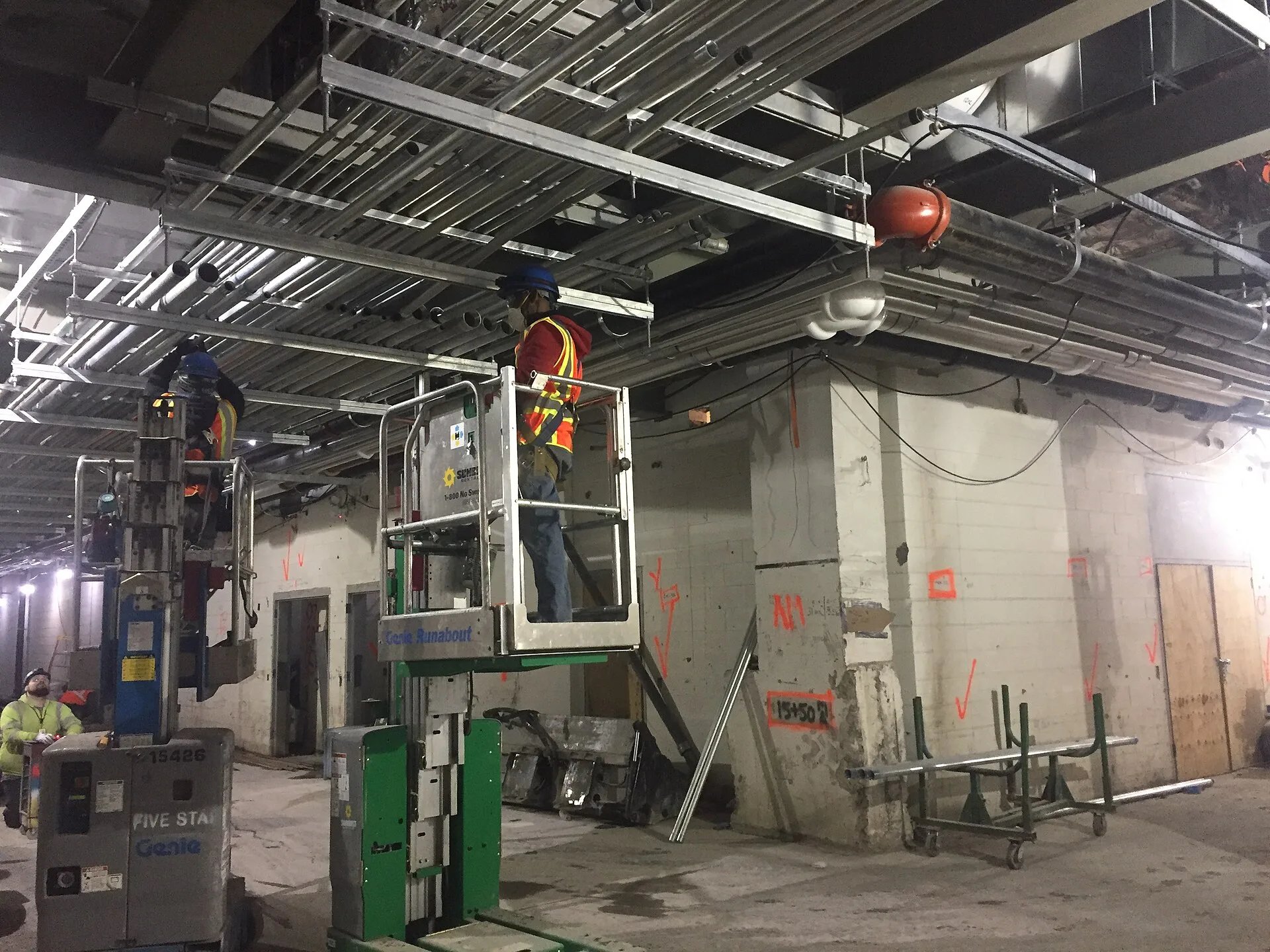 Ductwork installation in the future LIRR passenger concourse. (CM014B, 01-17-2019). How to Estimate Ductwork Installation Quantities for a Bid