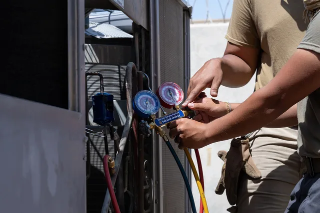 Heating, ventilation and air conditioning technicians assigned to the 379th Expeditionary Civil Engineer Squadron use a pressure gauge to inspect the condition of a newly repaired A/C unit at an undisclosed location within the U.S. Central Command area of responsibility, June 26, 2024. The HVAC team. Covering an HVAC contractor business: insurance types and typical premiums